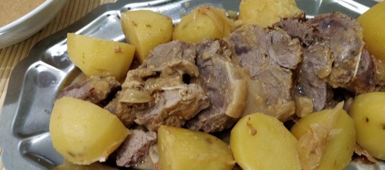 Rôti de porc au lait et pommes de terre